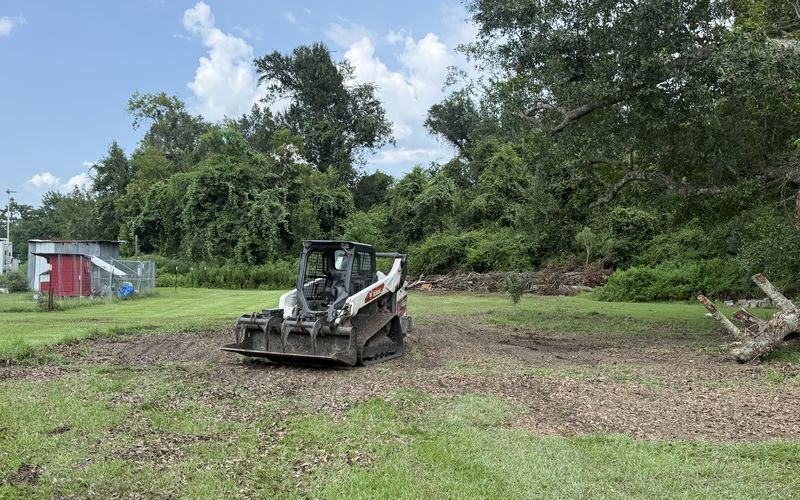 Land clearing with excavator
